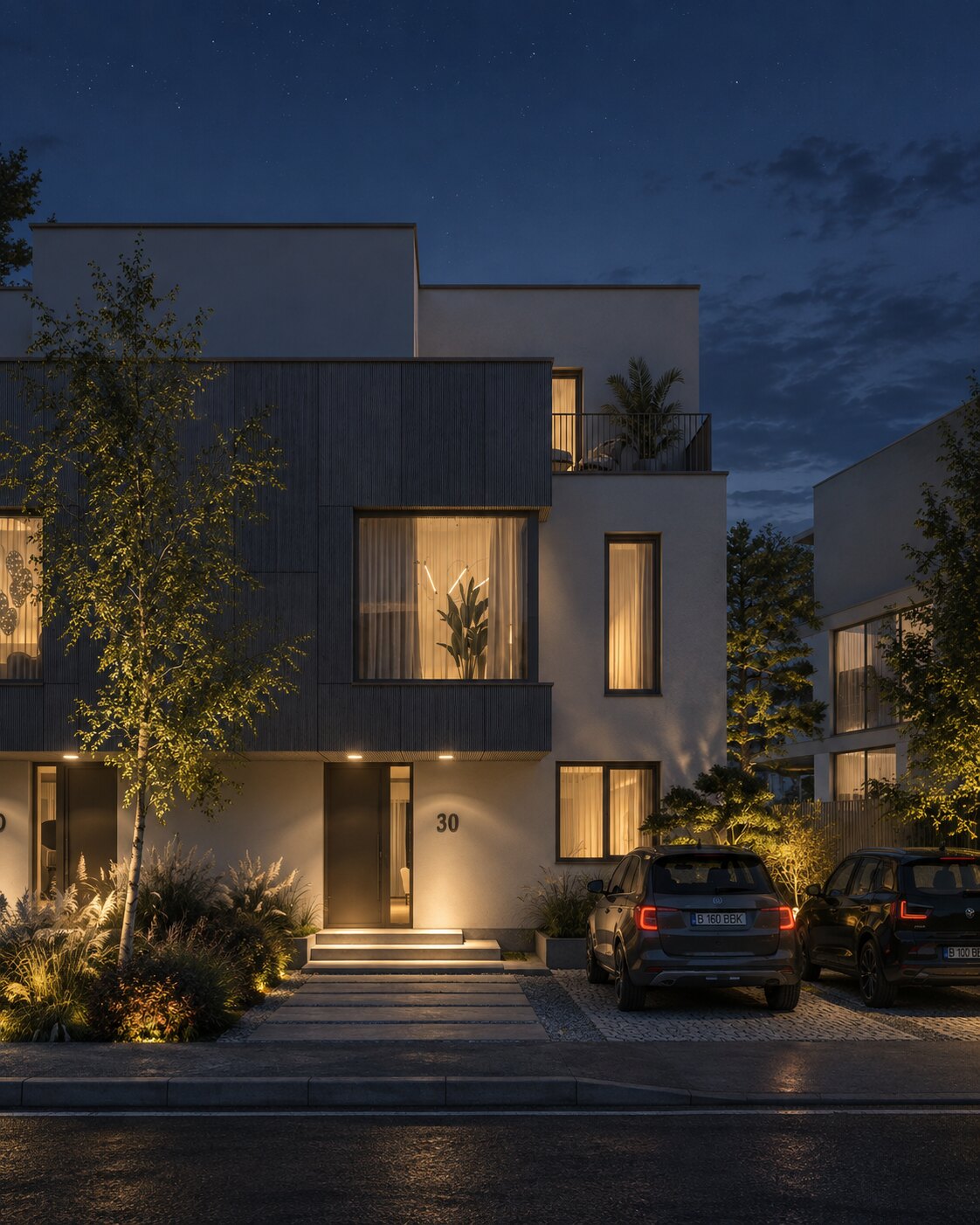 Green Lake townhouses at dusk, interiors lit behind timber-clad facades